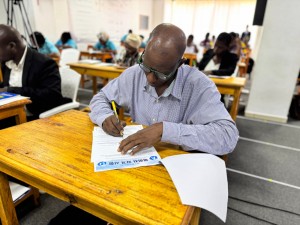A Tanzanian Protestant pastor answering questions during the “Open Revelation Bible Exam”