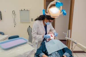 Paulus dentist Dr Anita Paulus working on dental implants procedure at Paulus Dental Paulus Orthodon
