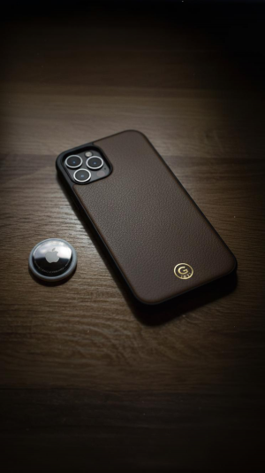 Brown iphone and airtag