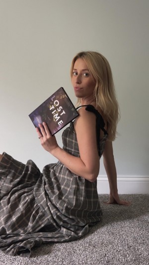 Holly Holding Lost Time