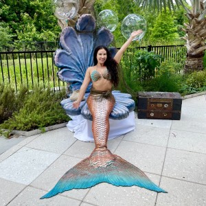 Mermaid meet and greet giant clam throne Aquamermaid