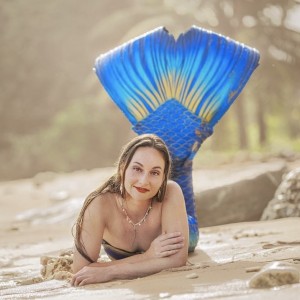 Mermaid on a sandy beach blue mermaid tail Aquamermaid