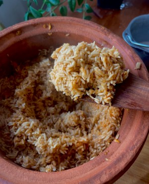 Spanish rice cooked to perfection in a clay pot