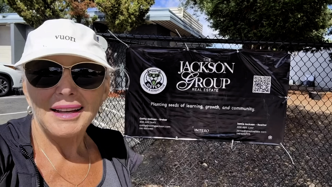 Cathy Jackson in from of Oster Elementary  Garden Sponsorship