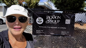 Cathy Jackson in from of Oster Elementary - Garden Sponsorship