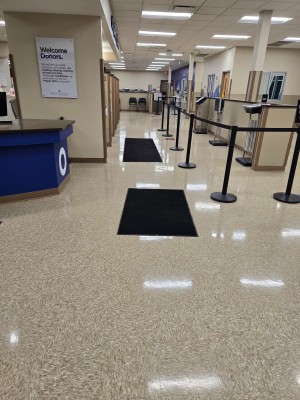 Medical testing facility floor waxing