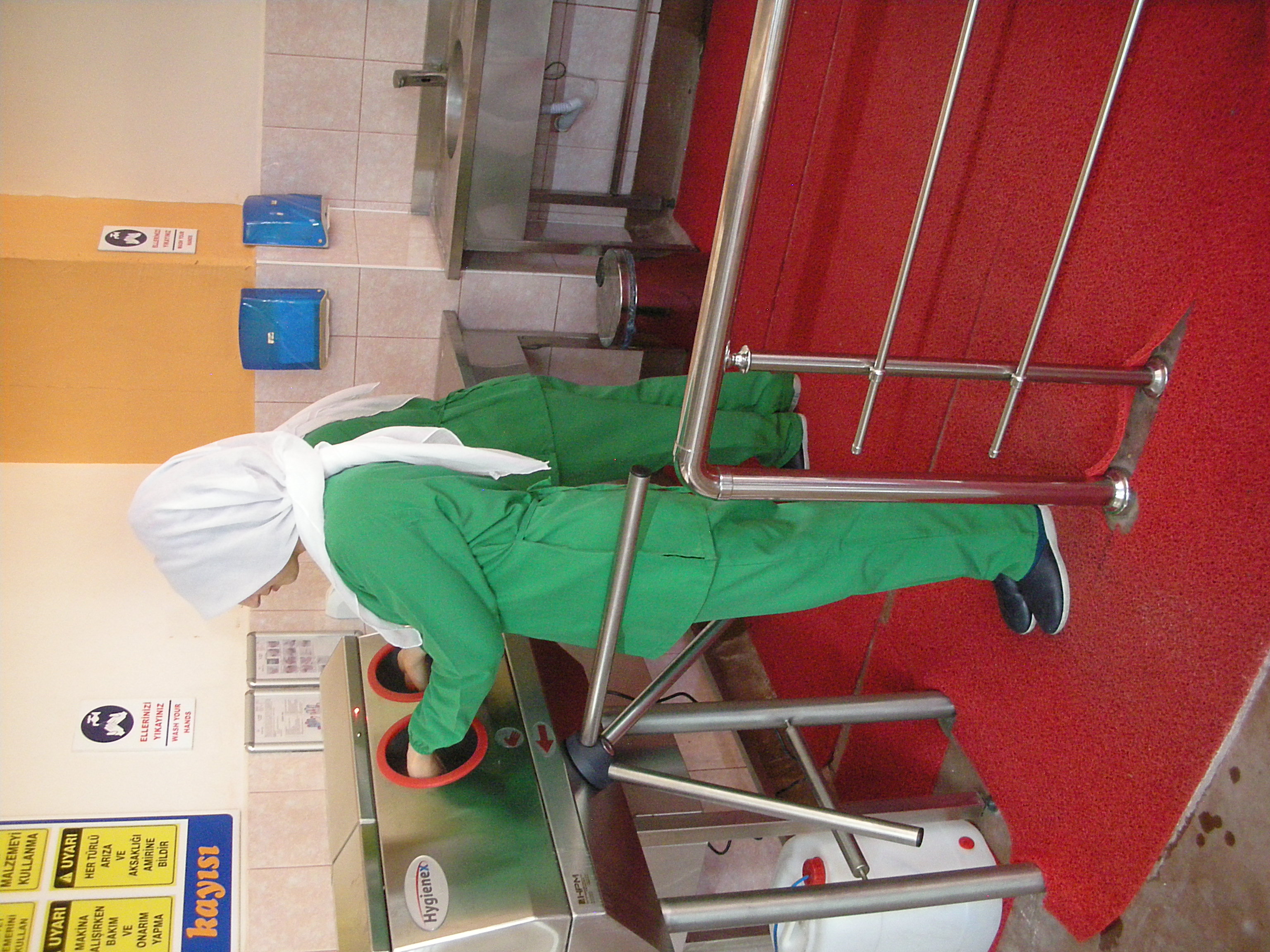 BRCGS  compliant hygiene and food safety entrance  staff preparing for production