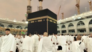 men gathered around kaba in mecca