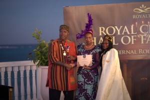 Inductee receiving her certificate at the grand inauguration in Zanzibar