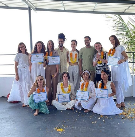 Student Celebrating Completion of Yoga Teacher Training at Rishikul Yogshala
