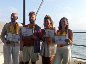 Student Holding Yoga Teacher Training Certificate at Rishikul Yogshala