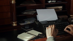 Detective interviews person of interest.