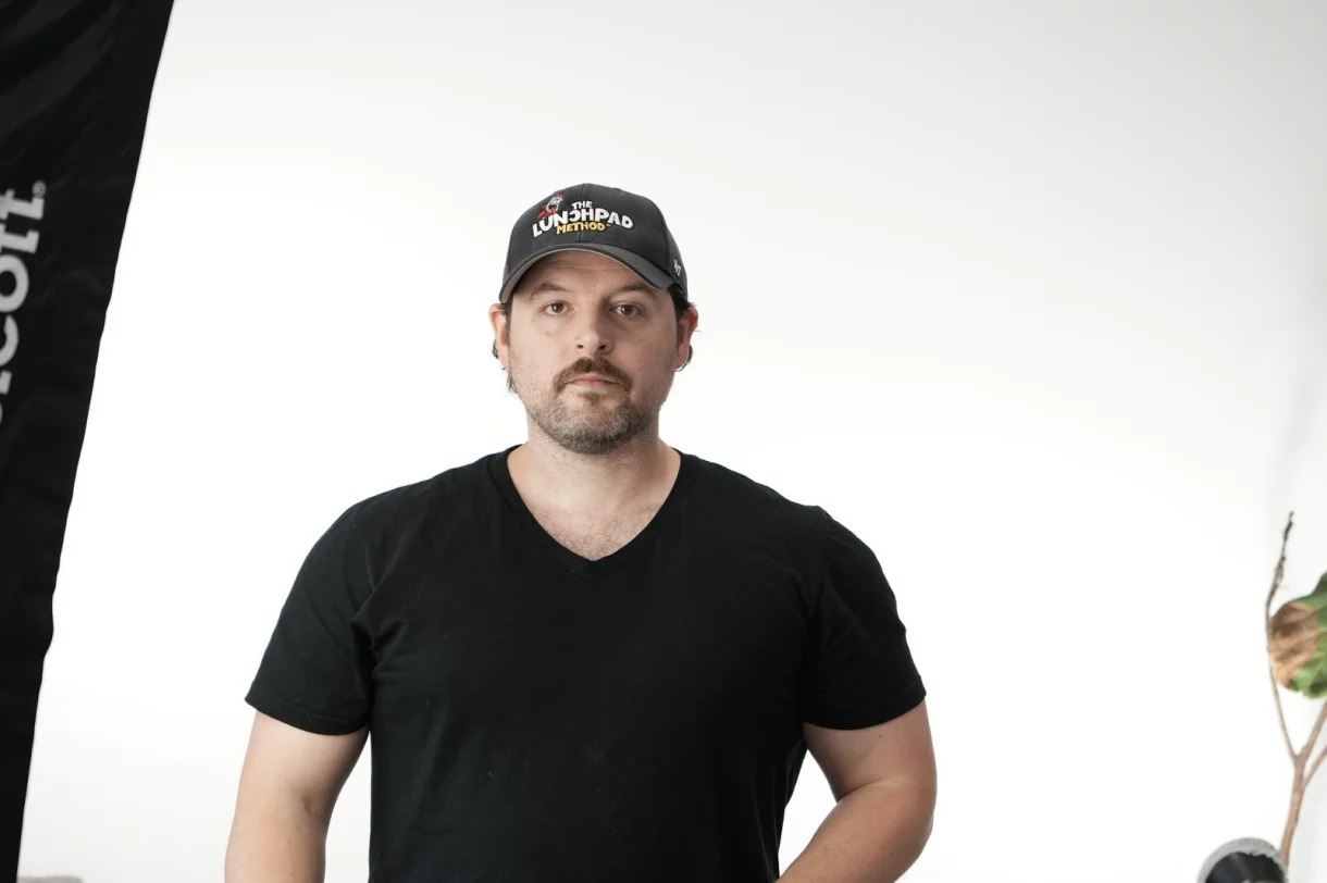 Andrew Lee Jenkins professional photo shoot with man in black tshirt and cap