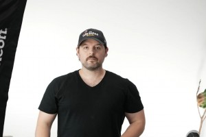 Andrew Lee Jenkins professional photo shoot with man in black tshirt and cap