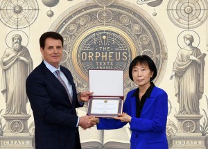 South Korean poet Sun Hyang Kim (right) receives the 2025 Orpheus Texts Book of the Year
