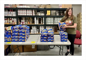 Preparing Pet Food for Donations At Planned PEThood