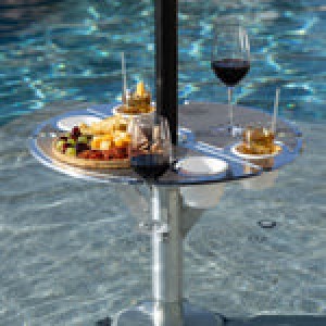 Closeup of Bajamate aluminum in-pool table with adapter and snacks with drinks