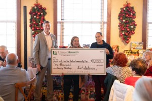 David Shapiro, of ohnson Brunetti, presents check to ABCD representatives