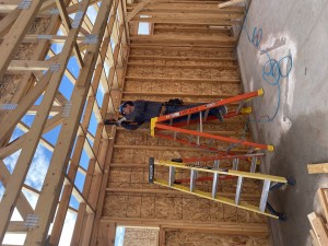 Dr Jeffrey Kesten making Habitat for Humanity
