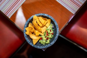 Crispy nachos served with fresh guacamole