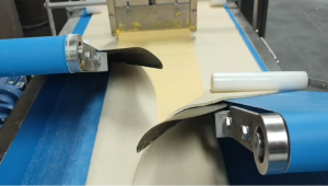 the production line delivers consistency not through rigid standardization but through precise contr