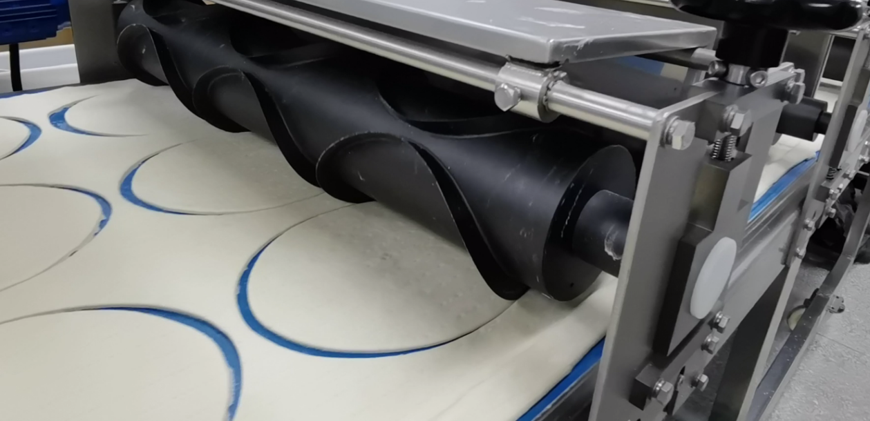 Trim waste generated during cutting is automatically collected and returned through a closed loop sy