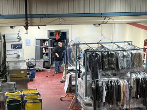 Donated coats and accessories fill boxes at Cousino Restoration coat drive