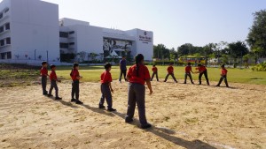 Students participating in outdoor learning and physical activities at the Ambaji campus
