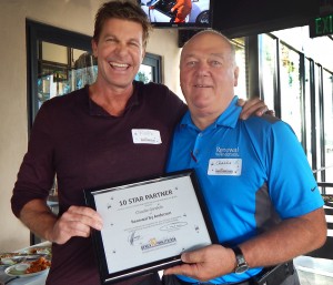 Ralph Harris presented Charlie Gindele from Renewal by Andersen with a 10 Star Partner certificate to pay homage to their ten years.