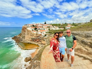 Guests enjoying a sintra tuk tuk tour with coastal views