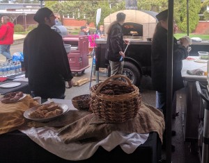 North Bend Blazing Bull Dogs in the field with their customized Fire Within Oven