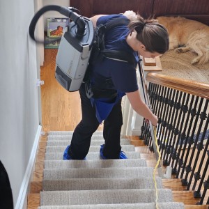 ecomaids team member performing eco-friendly home cleaning 