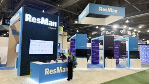 resman by inhabit trade show booth front view