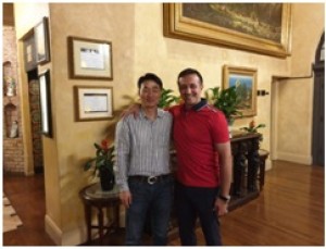 AgostinoSibillo with James Kim after signing the $50 million contract