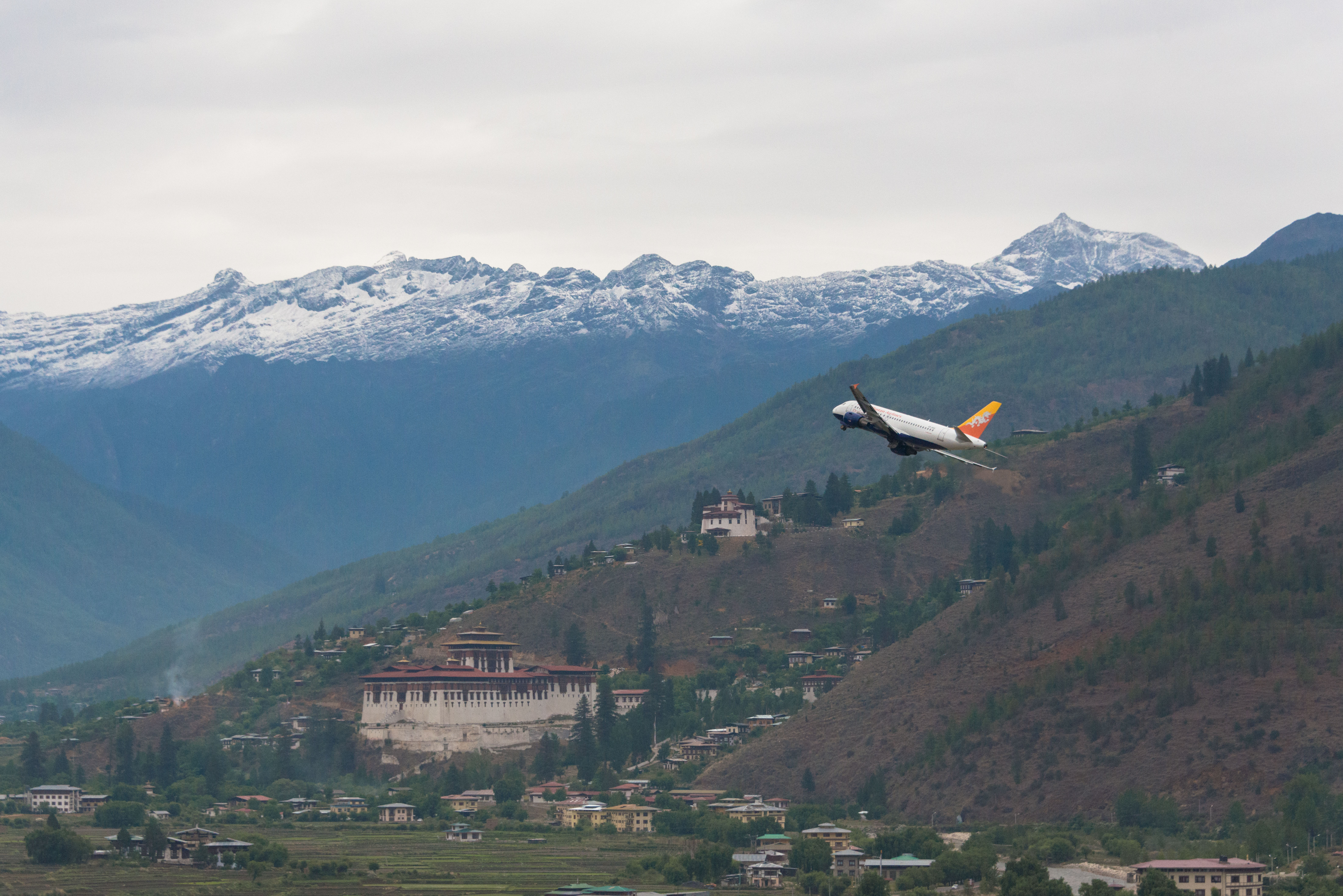 Drukair taking off from Bhutan with clear mountain views