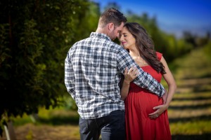 Maternity couple session highlighting connection and anticipation