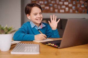 preteen boy uses laptop make online classes saying hello teacher 158595 7536