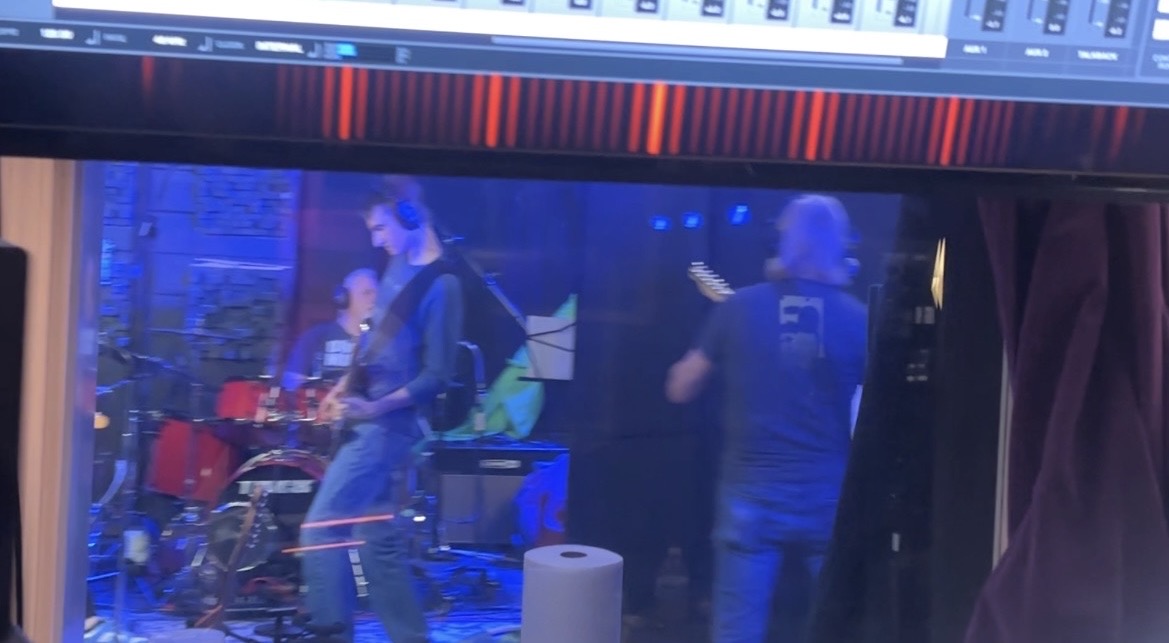 Gene performing live in the studio with their band The Scene