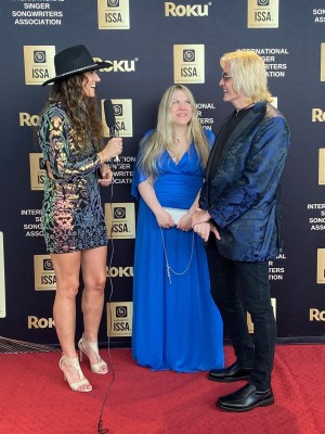 Ana & Gene being interviewed live on the red carpet at the ISSA Awards.
