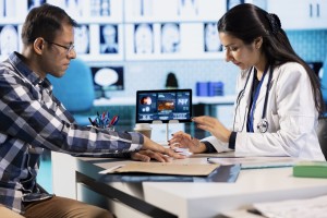 healthcare professional uses oximeter measure oxygen levels