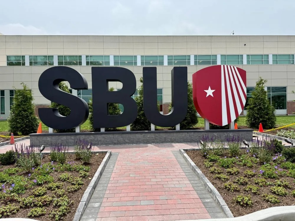 Genesis Signs – Graphics Delivers Installation Ahead of Graduation Under Tight 12-Week Timeline