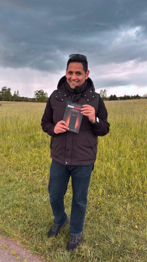 Ashford Menezes with his new book: Scams Unmasked