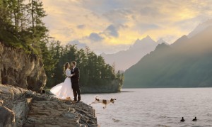 An elegant lakeside cliffside couple portrait captured by a professional portrait photographer in VT