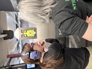 Instructor Sara training student