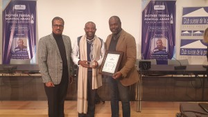 Junior Nzita Nsuami felicitated by Dr. Abraham Mathai