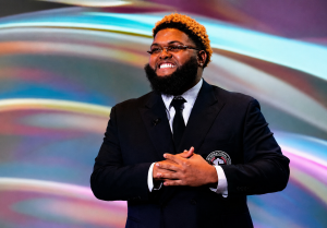 Druske will make history as the youngest host at the age of 31