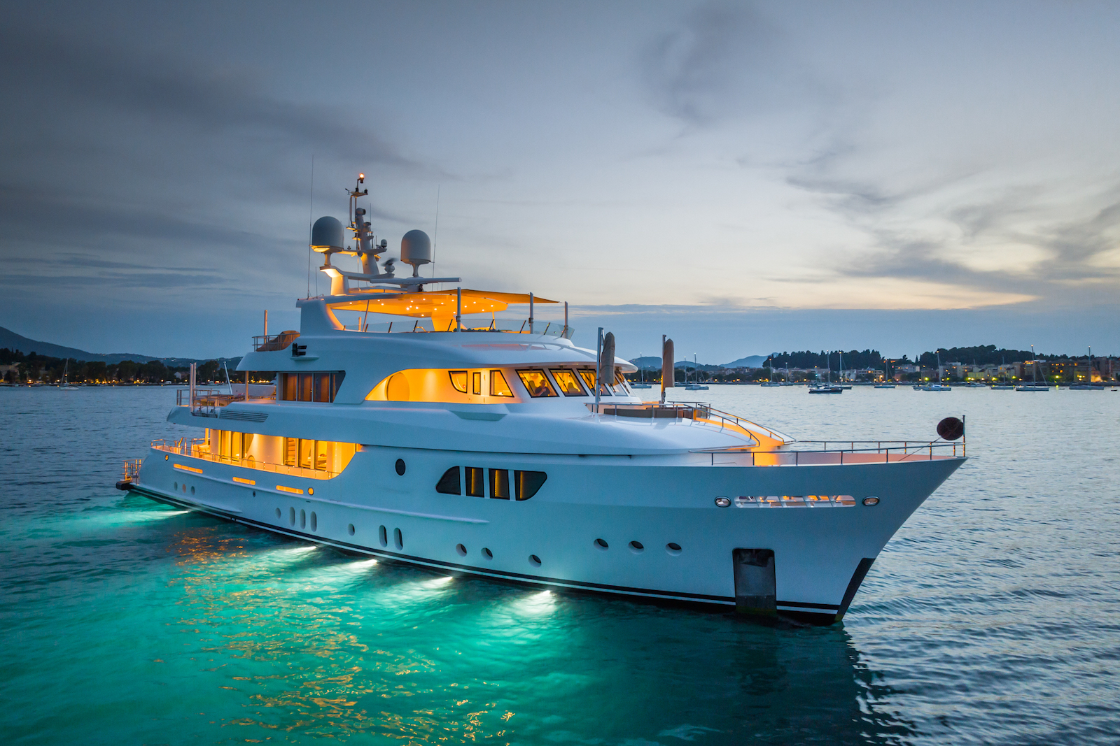 Serenity yacht for charter  at anchor by night