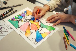client making art during an art class at veda sikkim