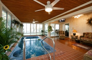 Sunroom with Studio Roof Style Featuring the Tuscany Wood Grain Finish™ by TEMO Roof Panels