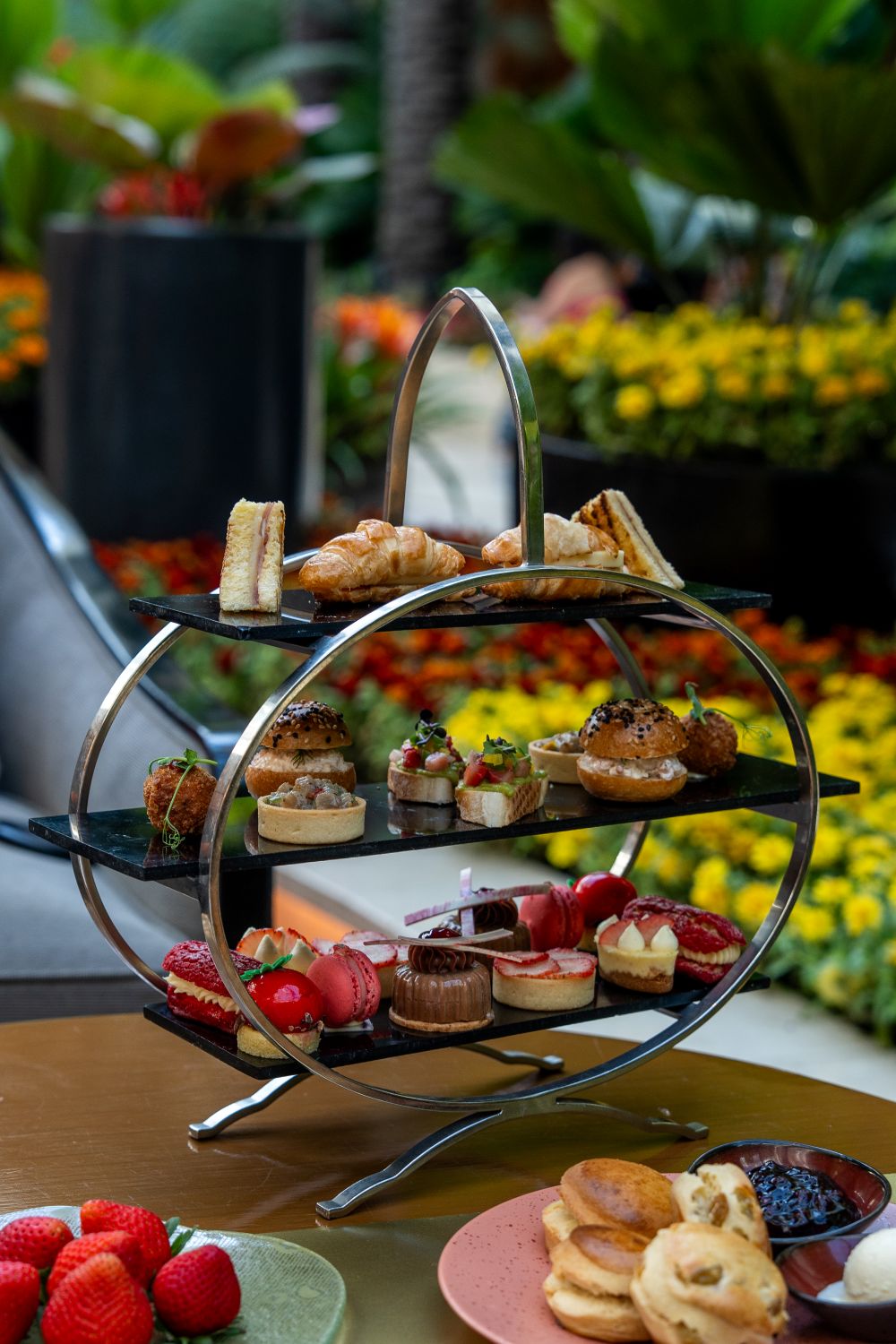 An Elegant Tier of Delicate Tea Sandwiches Savory Delicacies and Sweet Delights An Elegant Tier of Delicate Tea Sandwiches Savory Delicacies and Sweet Delights